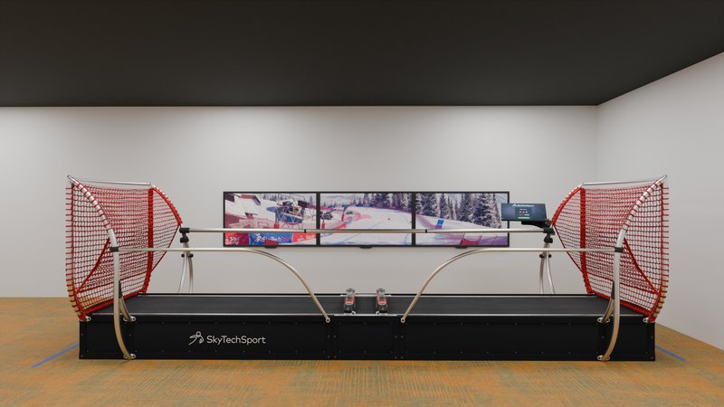A SkyTechSport Ski Simulator is displayed in a clean white studio environment, featuring a wide sliding platform with the SkyTechSport logo, curved safety bar with red safety netting on both sides, and a triple-monitor screen setup showing alpine ski racing footage.