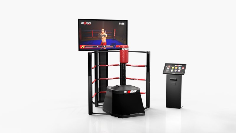 A clean studio render of the BotBoxer robotic boxing training system, featuring a red punching target on a motorized base surrounded by a boxing ring-style frame with red ropes, a mounted overhead display showing the BotBoxer game interface, and a standalone touchscreen control kiosk beside it.